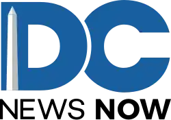 Large, thick blue letters DC, with the D sitting atop the C, and the words "NEWS NOW" in black. On the left side of the letter D is a representation of the Washington Monument.