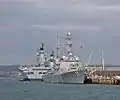 Mitscher at Portsmouth in October 2008 berthed with HMS&nbsp;Ark Royal and HMS&nbsp;Illustrious.