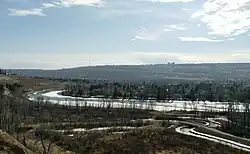 A view from the escarpment of Dales Hodges Park on the Bow River overlooking Bowness.