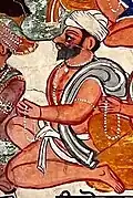 Detail of Bhagat Dhanna from a fresco, circa mid-19th century.