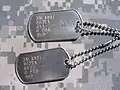 United States Army ID tags (serial number partially obscured), modern, designation (for Buddhist): BUD