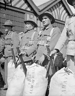 Image 17Men of the Māori Battalion, New Zealand Expeditionary Force, after disembarking at Gourock in Scotland in June 1940 (from History of New Zealand)