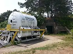 EDALHAB, an underwater habitat used for saturation diving experiments in Lake Winnipesaukee in the late 1960s, now located outside the Seacoast Science Center.[15][16][17] Battery 204, a former 6-inch gun battery, is in the background.