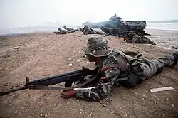 An Ecuadorian Marine wearing an Ephod Combat Vest during an amphibious assault exercise (UNITAS), 13 August 1991.
