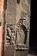 Defaced & vandalised pre-Islamic motifs taken from demolished Hindu & Buddhist structures incorporated into the building
