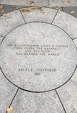 Granite medallion inscribed with Adlai Stevenson's quote, designed by Michael Dwyer.