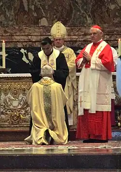 Rahi lays on his hands on Maurizio Malvestiti during his episcopal ordination as Cardinals Sandri and Müller observe, 11 October 2014