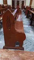Pews with carved woodworks