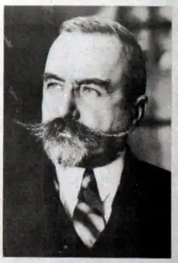 Yevgeny Miller, with a beard and a large mustache