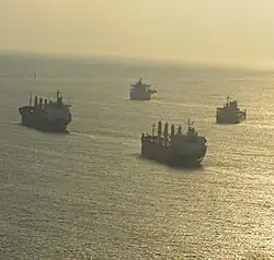 Bolivar Roads and single file approach of maritime vessels