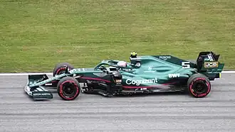 2021: Sebastian Vettel driving the Aston Martin AMR21 at the 2021 Austrian Grand Prix