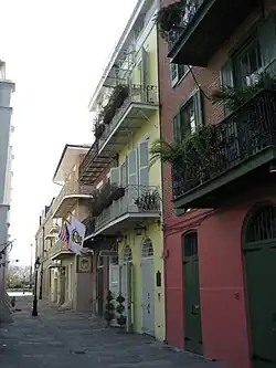 A yellow house on the cobbled streets of New Orleans