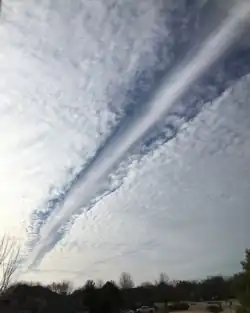 Elongated fallstreak hole over Bixby, United States