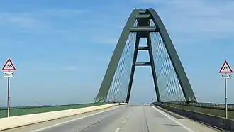 Fehmarn sound bridge seen from south. In use as a road bridge, rail bridge and with bike path