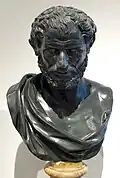 Tentatively identified as Democritus, this portrait from the square peristyle has also been suggested to be Aristotle, Solon, Philopoemen, or Heraclitus