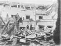 Firefighters work at the scene of the explosion