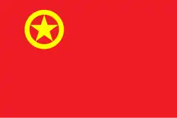 A golden star placed inside a golden ring, all placed on a red background.