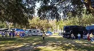 Pregame tailgating, 2019. Note Thomas Hall through the trees, background center