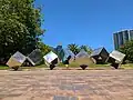 Bert Flugelman 1979, Tumbling Cubes, polished stainless steel sculpture, Margaret Timpson Park, Canberra