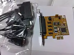 A four-port serial (RS-232) PCI Express ×1 expansion card with an octopus cable that breaks the card's DC-37 connector into four standard DE-9 connectors