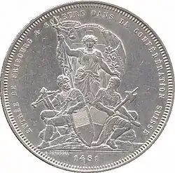 Two seated soldiers, one wielding crossbow and one a halberd, supporting shields below standing Helvetia holding Swiss flag. Legend along edge, "1481" in exurge.