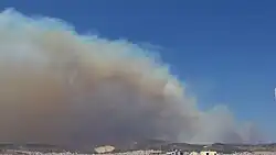 August 22 Fire at approximately 12:50&nbsp;am, as seen from Ilion, Attica, burning near Fyli emitting large amounts of smoke.