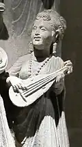 Musician playing for a dance, Gandhara, 2nd-4th century AD.