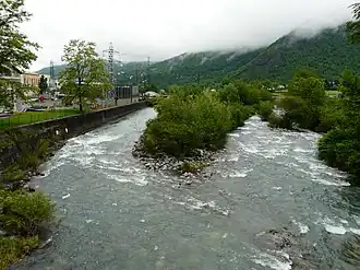 Viewed from the bridge of the D921 road, the Gave de Gavarnie marks the boundary between Soulom hydroelectric power station to the left and centre, and Villelongue on the right
