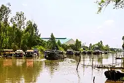 Boat transports rice to the rice mill in Vinh Binh commune, Chau Thanh district, An Giang province, Vietnam.