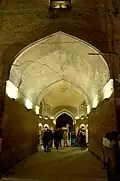 Entrance to the gateway is illuminated at night.