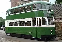 A 1936 Liverpool streamlined tram outside the reconstructed Derby Assembly Rooms at Crich Town End
