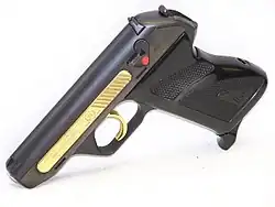 A Harrington & Richardson HK4, one of the 2,000 commemorative specimens produced in 1971, with the name plate and trigger made of gold.