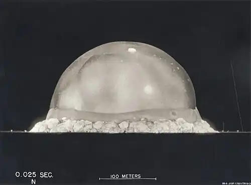 The Trinity explosion, 25 ms after detonation. The viewed fireball hemisphere's highest point in this image is about 200 metres (660&nbsp;ft) high.