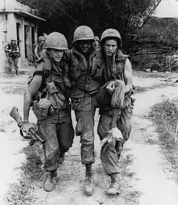 PFC Mauro, PFC Carter, and SP4 Widmer (Carter shot himself in the foot with a .45 pistol during the My Lai massacre.)