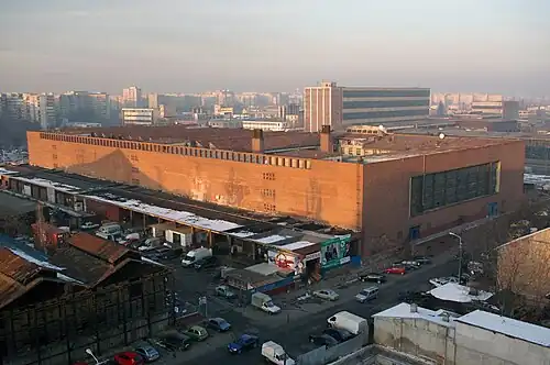 Obor Covered Market Hall, Bucharest, 1937–1942: by Horia Creangă and Haralamb Georgescu, 1942–1946: by Haralamb Georgescu[96]