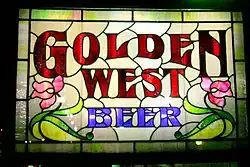 Beer sign outside of the bar