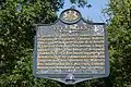 Photo taken in 2017 of PA Historical Marker in front of Ivy Mills Historic District