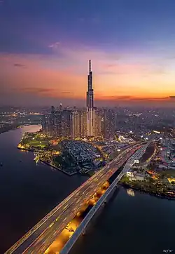 Landmark 81 at dusk with Saigon Bridge in Binh Thanh District