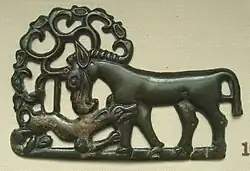 Bronze Ordos culture plaque, from the eastern end of Scythian art, 4th century BC; a deer attacked by a wolf