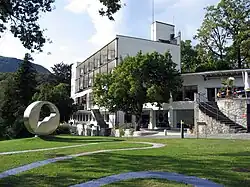 Hotel on Monte Verità, designed by architect Emil Fahrenkamp in 1927; built in Bauhaus style in 1928. Fahrenkamp furnished it with part of his East-Asian art collection. The hotel was renovated in 2008.