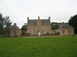 Front elevation showing the two pavilions in the forecourt. The one on the left (west) was for laundry; the one on the right (east) was a stable and coach house block[6]