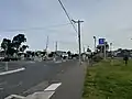 Hutton Street level crossing, located south of Thornbury station, next to the platforms, July 2024