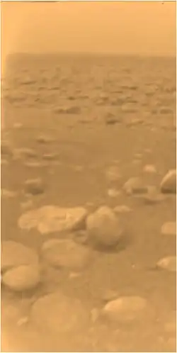 Pebbles on Titan's surface, photographed from a height of about 85&nbsp;cm by the Huygens spacecraft