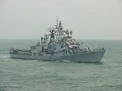 Ranvijay with sailors on deck in blue uniform