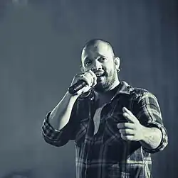 Liyanage performing at Acoustic Brew in 2010