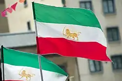 Two flags of the Imperial Lion and Sun flying.