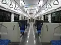 The interior of car KuMoHa E721-1005 of set P4-5 in January 2017