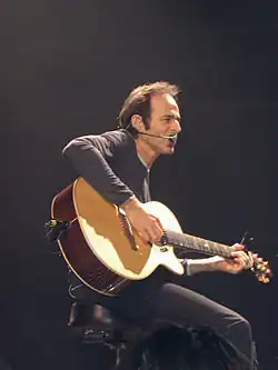 Goldman in 2002 at Le Zénith in Paris