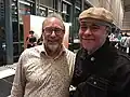 Wikipedia co-founder Jimmy Wales and Johnny Alegre pose for a photo in Wikimania 2023, Singapore