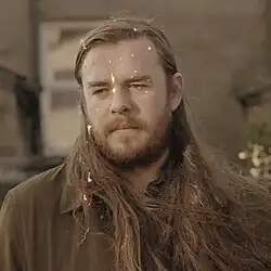 A sepia-toned photo of Flynn